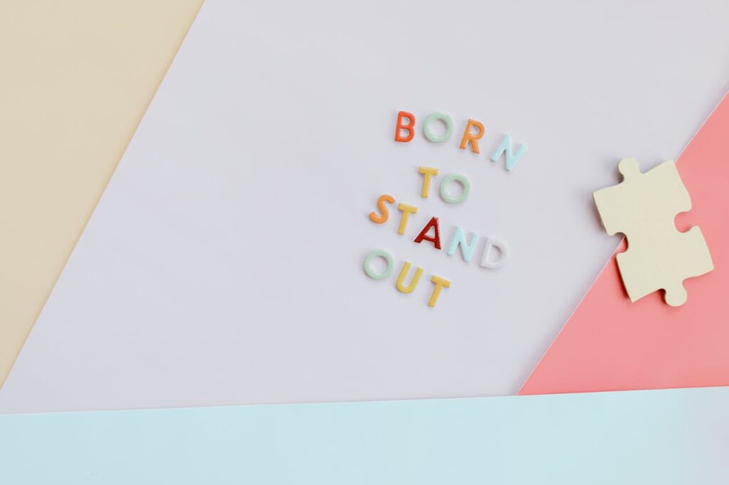 pexels-photo-8386134 Puzzle Piece near Colorful Letters on a Surface
